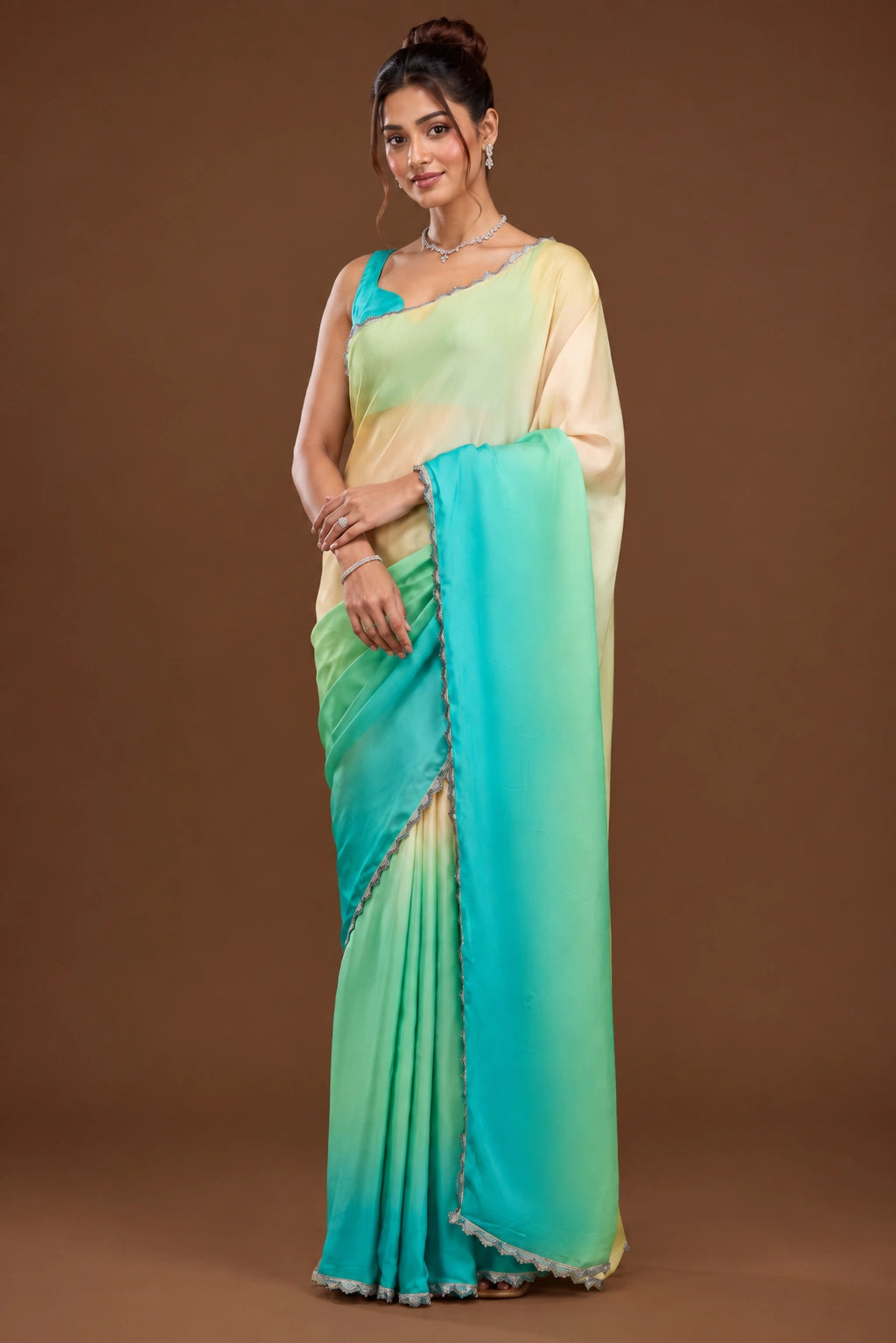 Cream to turquoise ombre georgette saree - side pose showing full drape