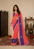 Peach Pink Satin Festive Saree with Indigo Blue Border and Zarkan Work