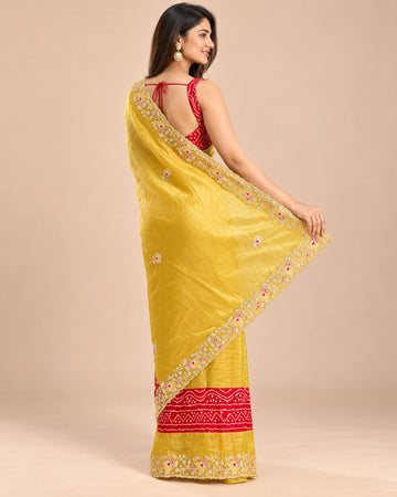 Yellow bandhani tissue silk saree - back view showing open back blouse