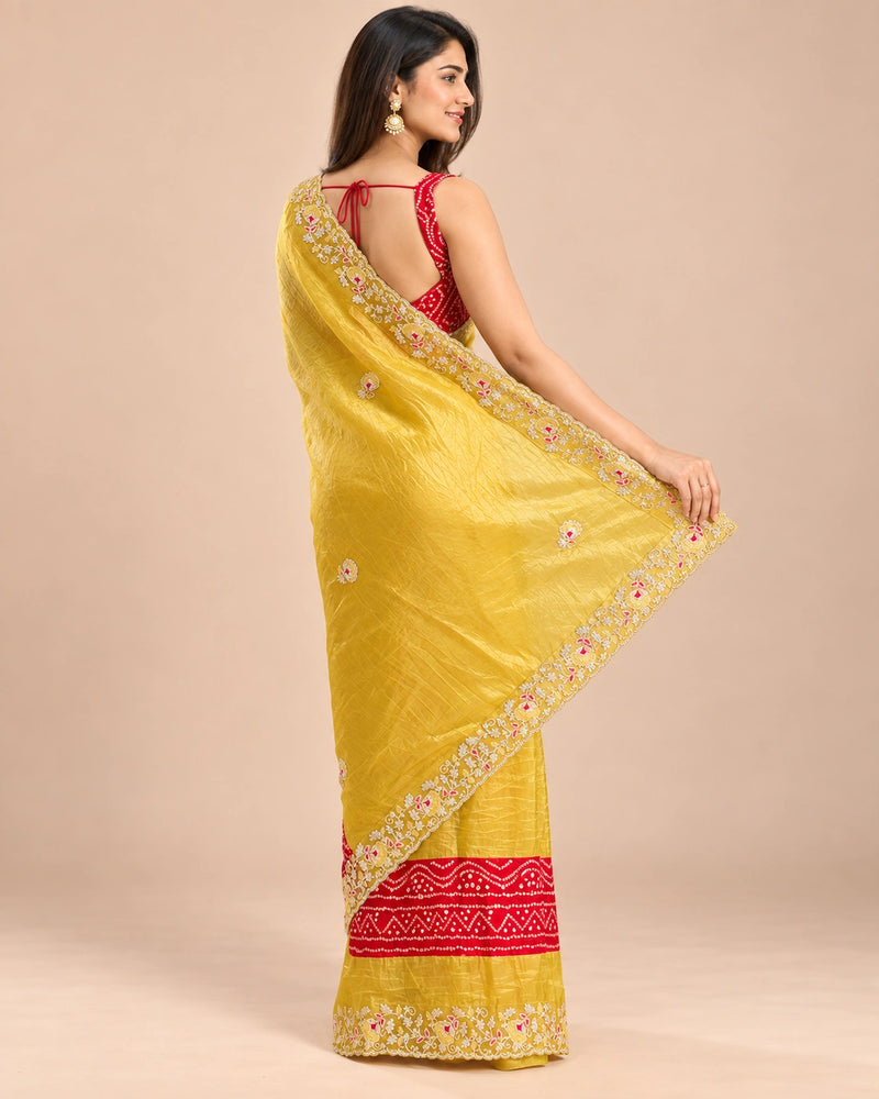 Yellow bandhani tissue silk saree - back view showing open back blouse