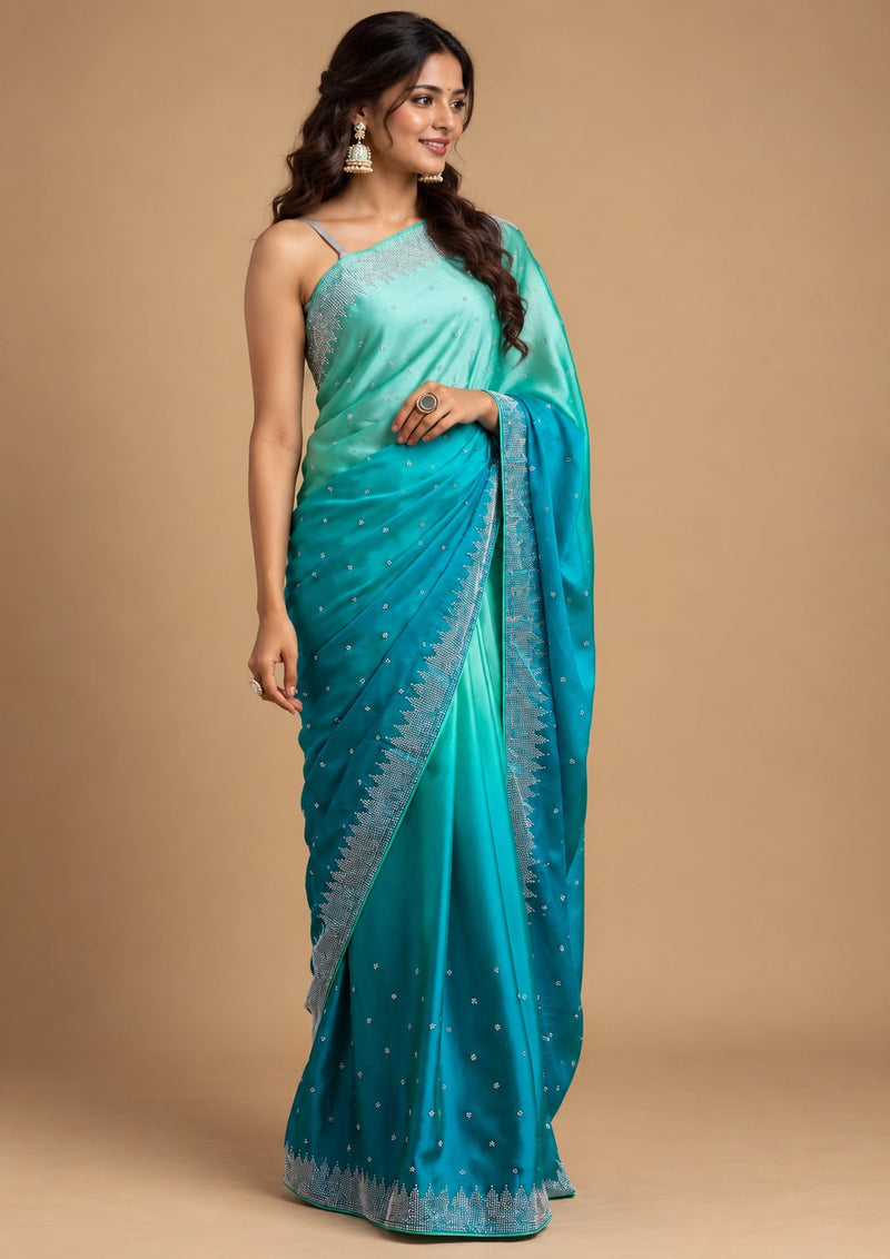 Teal ombre satin silk saree - fabric flat lay showing sequin butti detail