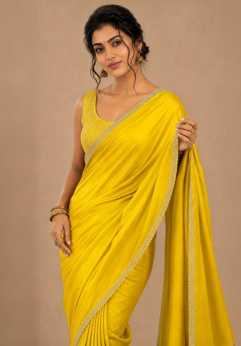 Yellow Satin Party Wear Saree with Zarkan Border