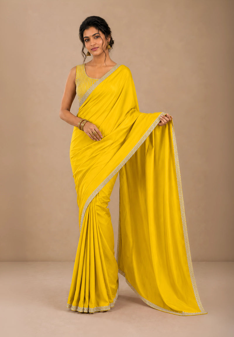 Yellow Satin Party Wear Saree with Zarkan Border