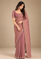 Dusty rose sequin georgette saree - side pose
