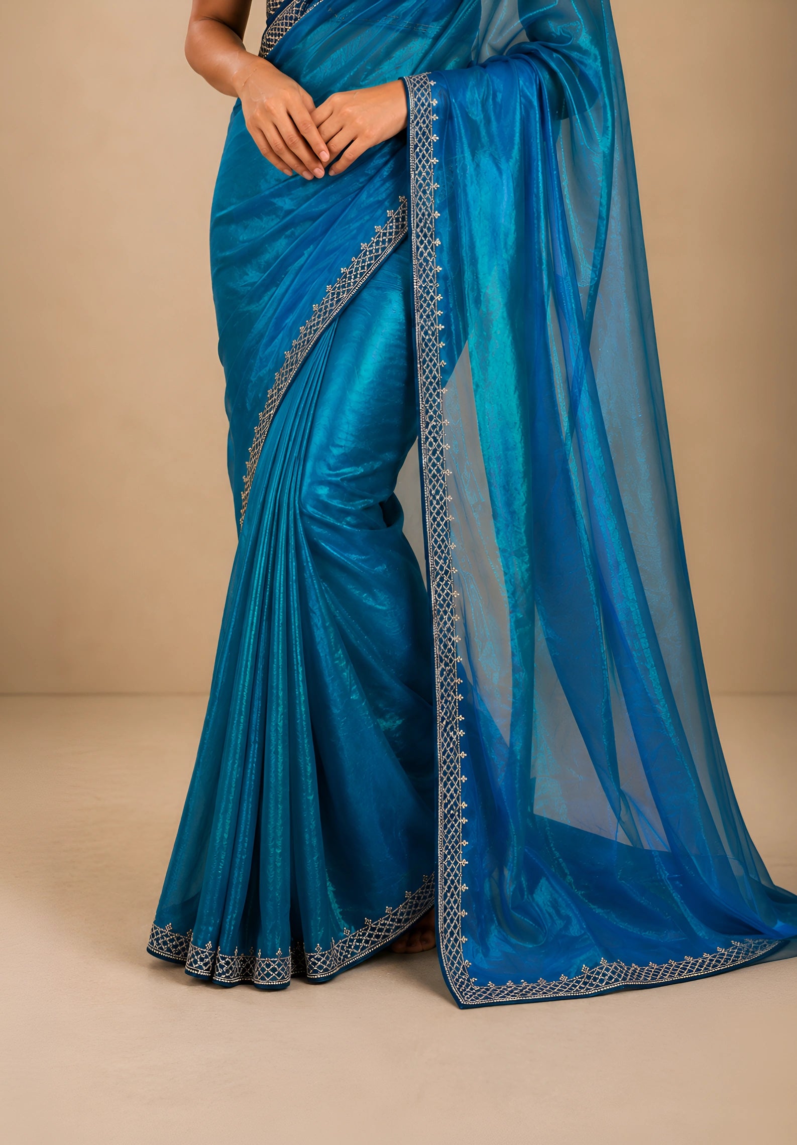 Ocean Blue Metallic Satin Festive Saree with Navy Blue Velvet Embroidered Blouse